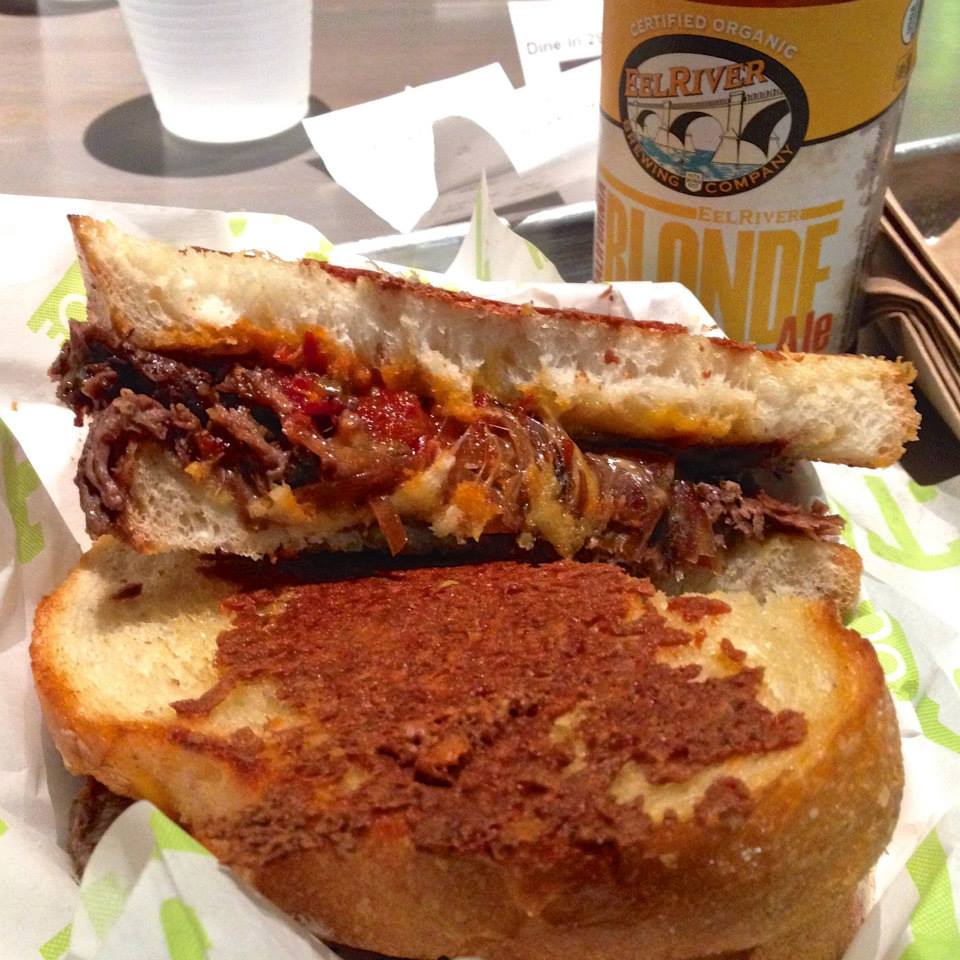 Short Rib Grilled Cheese: Braised Beef Short Rib, Lime Sambal Sauce, Grilled Onions, Cheese  Blend, Cotija Crusted Sourdough (and Eel River Organic California Blonde Ale)